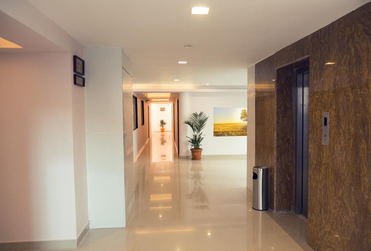 Hotel Rainbow Suites Kannur Bagian luar foto